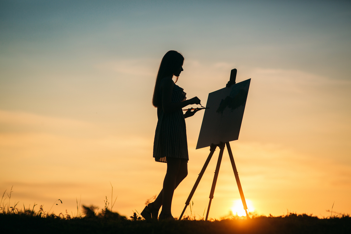 Woman Painting Outdoors